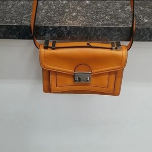 Loeffler and Randall purse